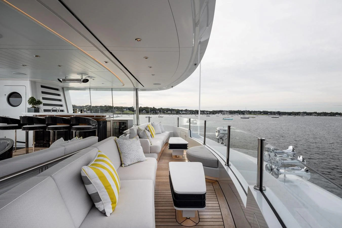 The aft deck offers a luxurious outdoor lounging area with comfortable seating and stunning views of the water. aboard SCOUT Yacht for Sale