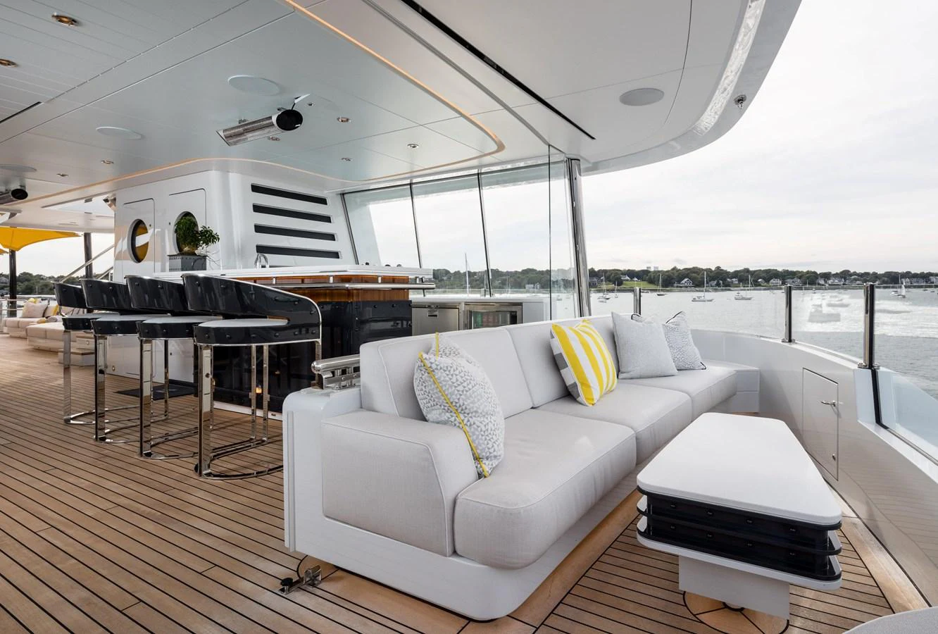The aft deck features a comfortable seating area with a view of the water. aboard SCOUT Yacht for Sale