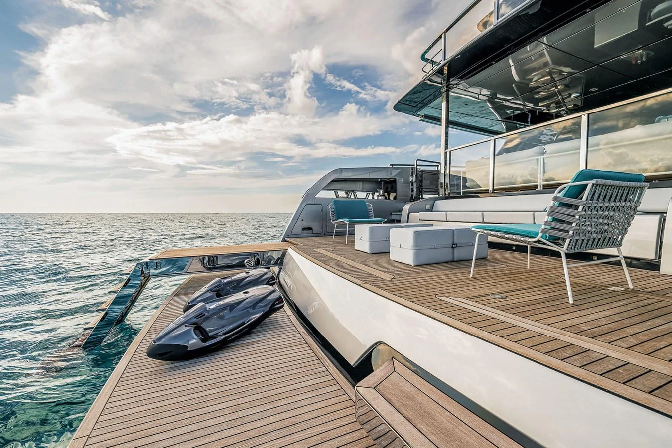 The aft deck offers a luxurious space with comfortable seating and easy access to the water. aboard RIVA 130/02 Yacht for Sale