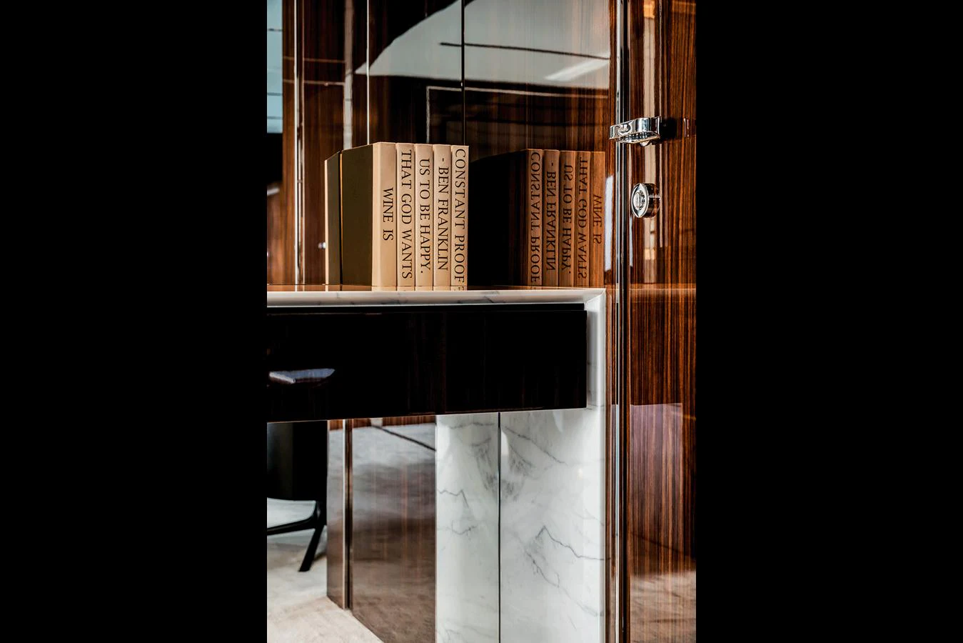 A sophisticated interior detail featuring polished wood and marble surfaces. aboard RIVA 130/02 Yacht for Sale