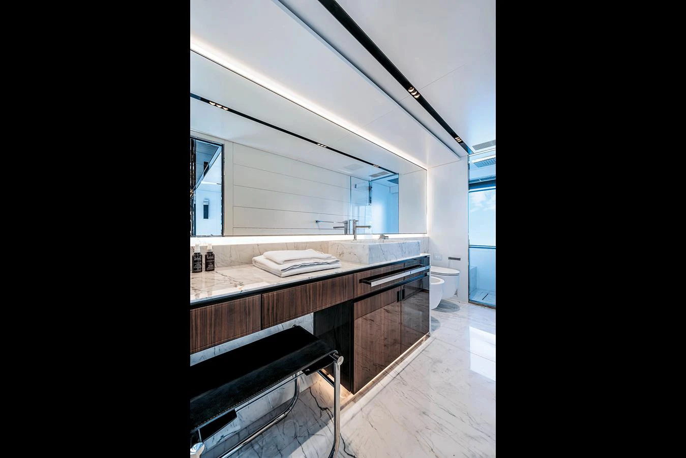 The yacht's bathroom features sleek modern design with luxurious finishes. aboard RIVA 130/02 Yacht for Sale