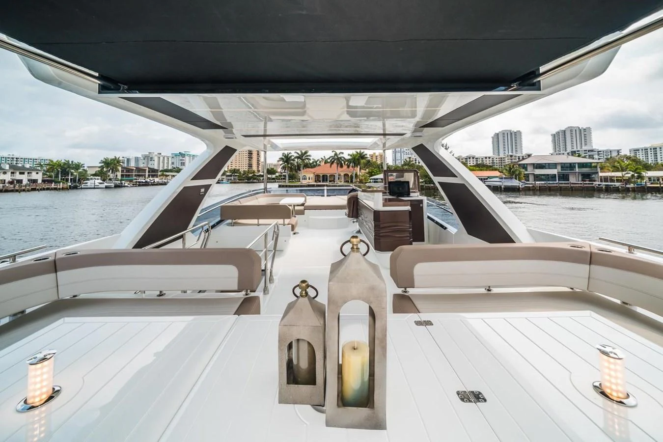 The flybridge offers a spacious and elegant outdoor area with modern furnishings and scenic views. aboard GALEON Yacht for Sale