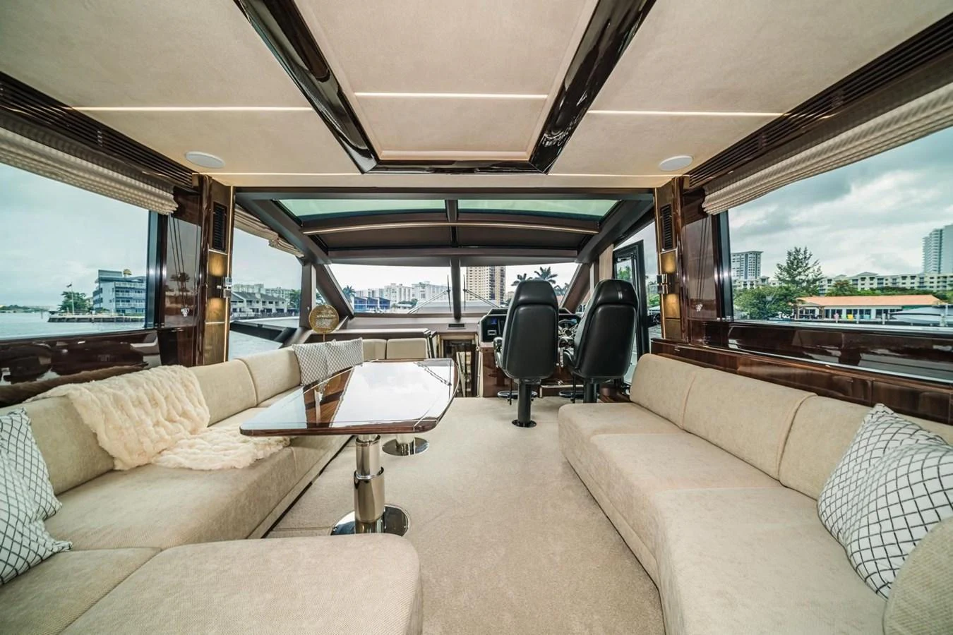 The salon offers a spacious and luxurious seating area with panoramic views. aboard GALEON Yacht for Sale