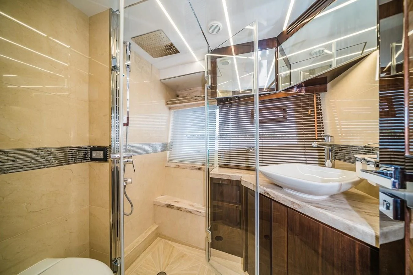 The yacht's bathroom features modern fixtures and a luxurious design. aboard GALEON Yacht for Sale