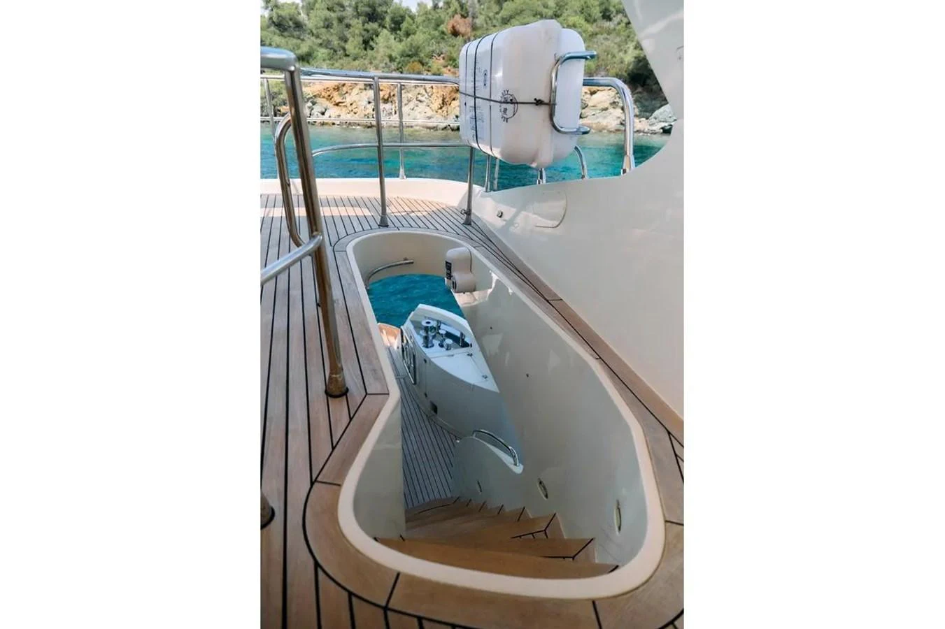 The yacht features a well-designed tender garage with easy access to the water. aboard MARQUIS 720 Yacht for Sale