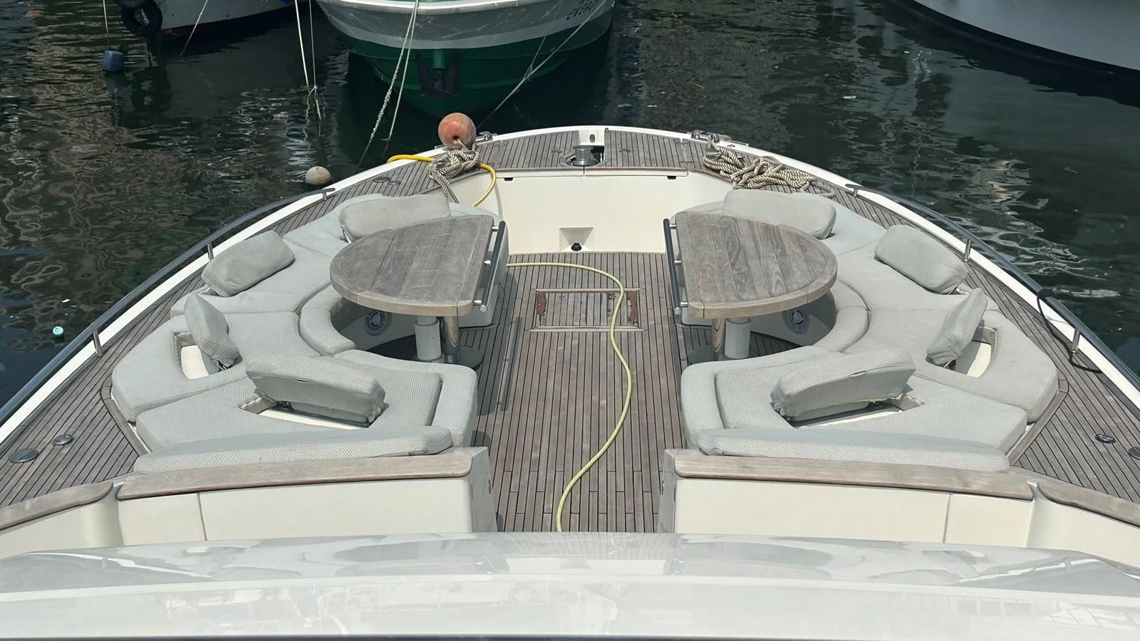 The foredeck features spacious seating and twin tables for alfresco dining or lounging. aboard AURORA Yacht for Sale