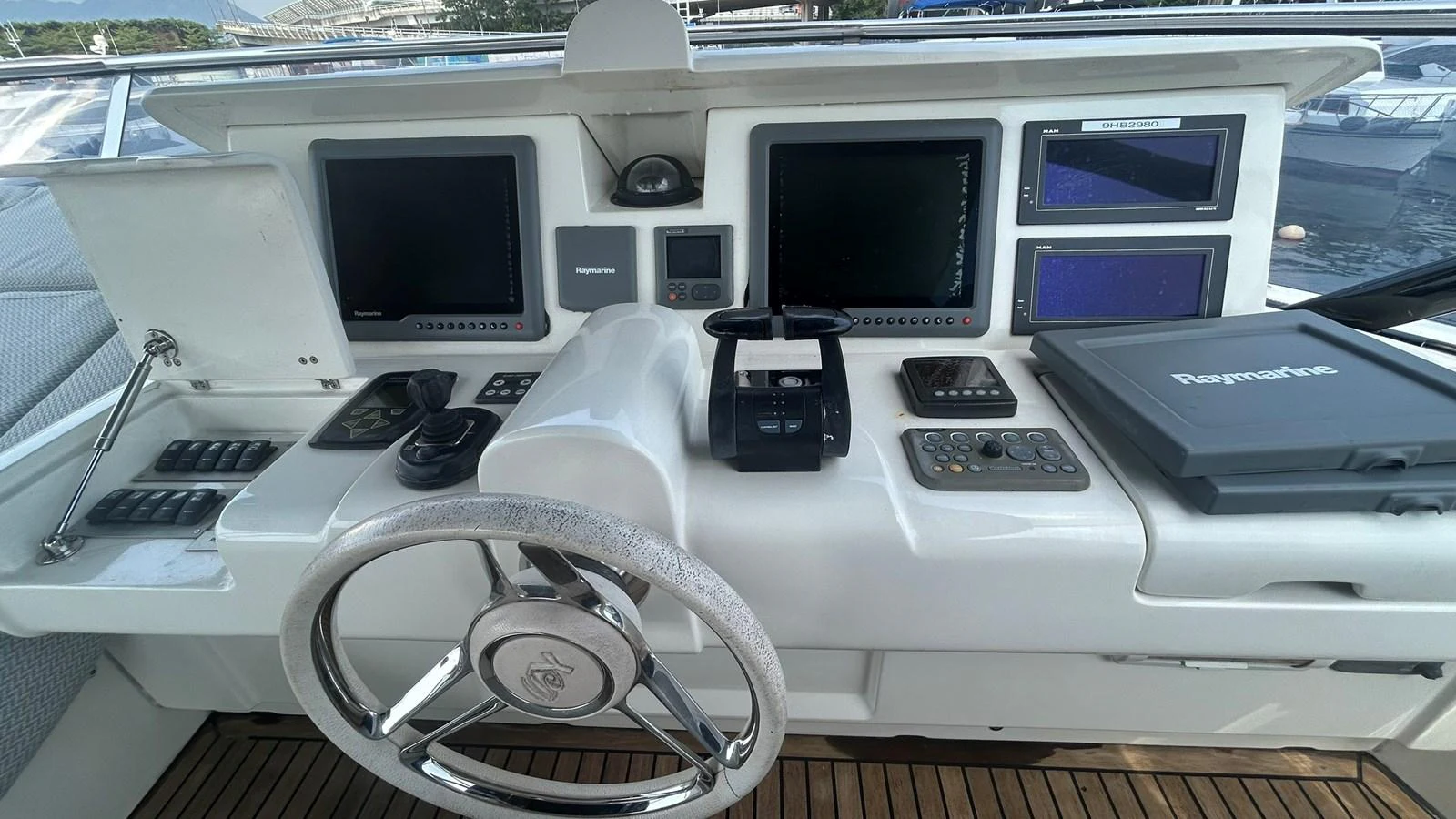 The helm station is equipped with advanced navigation and control systems for a seamless sailing experience. aboard AURORA Yacht for Sale