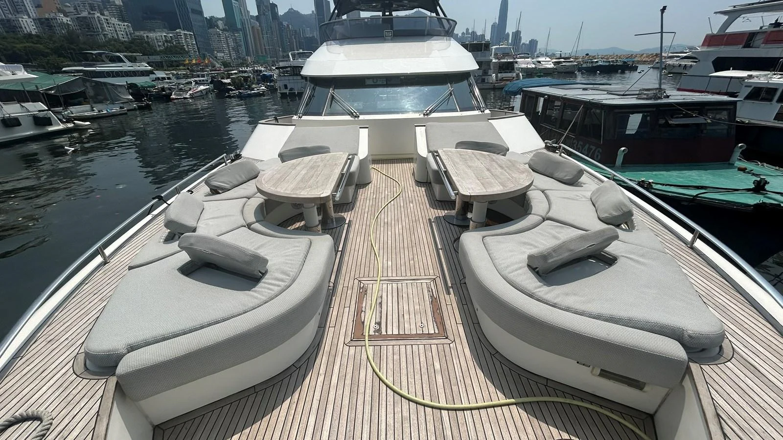 The yacht's foredeck features luxurious sun loungers and tables, perfect for relaxation and socializing. aboard AURORA Yacht for Sale