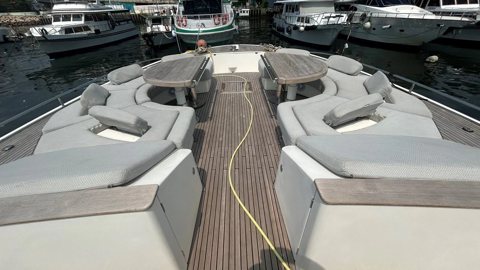 The yacht's foredeck features spacious sun pads and seating areas, perfect for relaxation and socializing. aboard AURORA Yacht for Sale