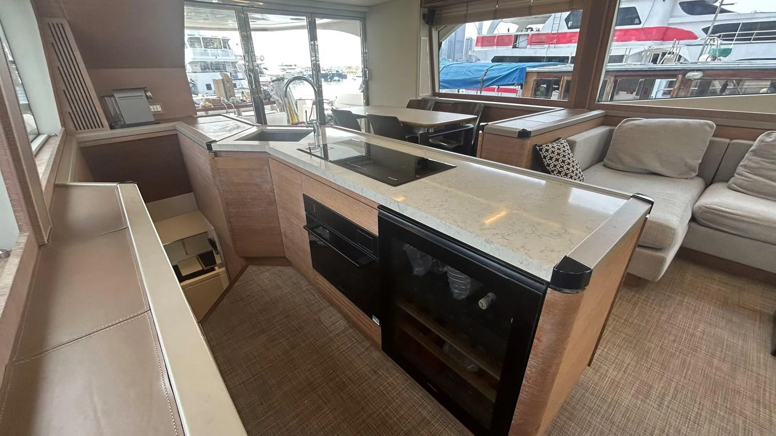 The yacht's galley features modern appliances and a cozy seating area, perfect for onboard dining and relaxation. aboard AURORA Yacht for Sale