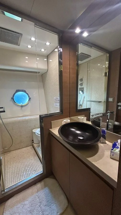 The yacht's bathroom features modern fixtures and a sleek design. aboard AURORA Yacht for Sale