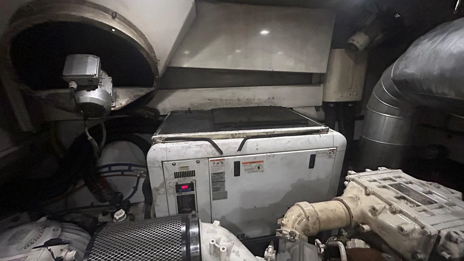The image showcases the engine room with various mechanical components and equipment. aboard AURORA Yacht for Sale