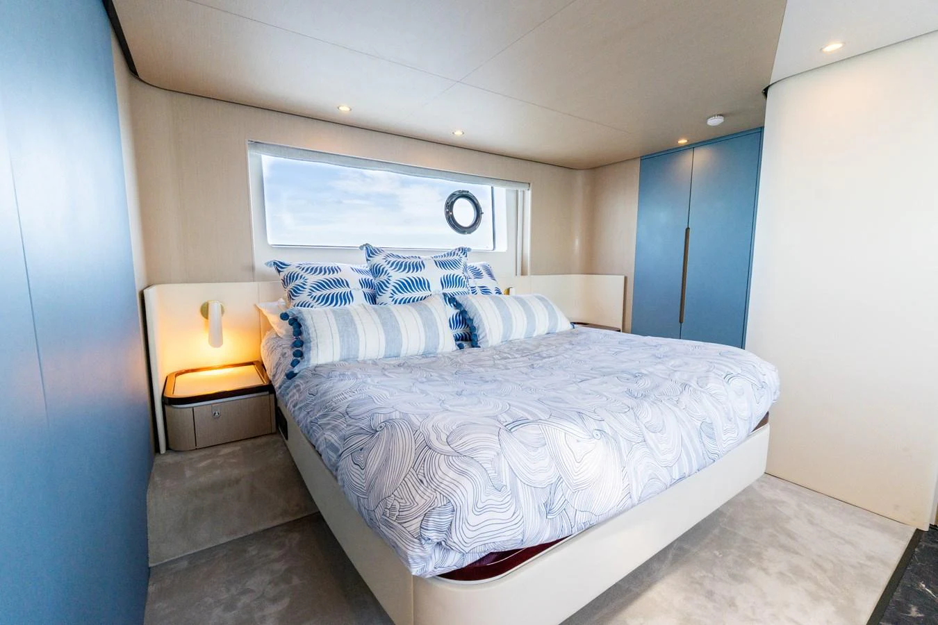 A cozy stateroom with a large bed and modern decor. aboard GONE PHISHING Yacht for Sale