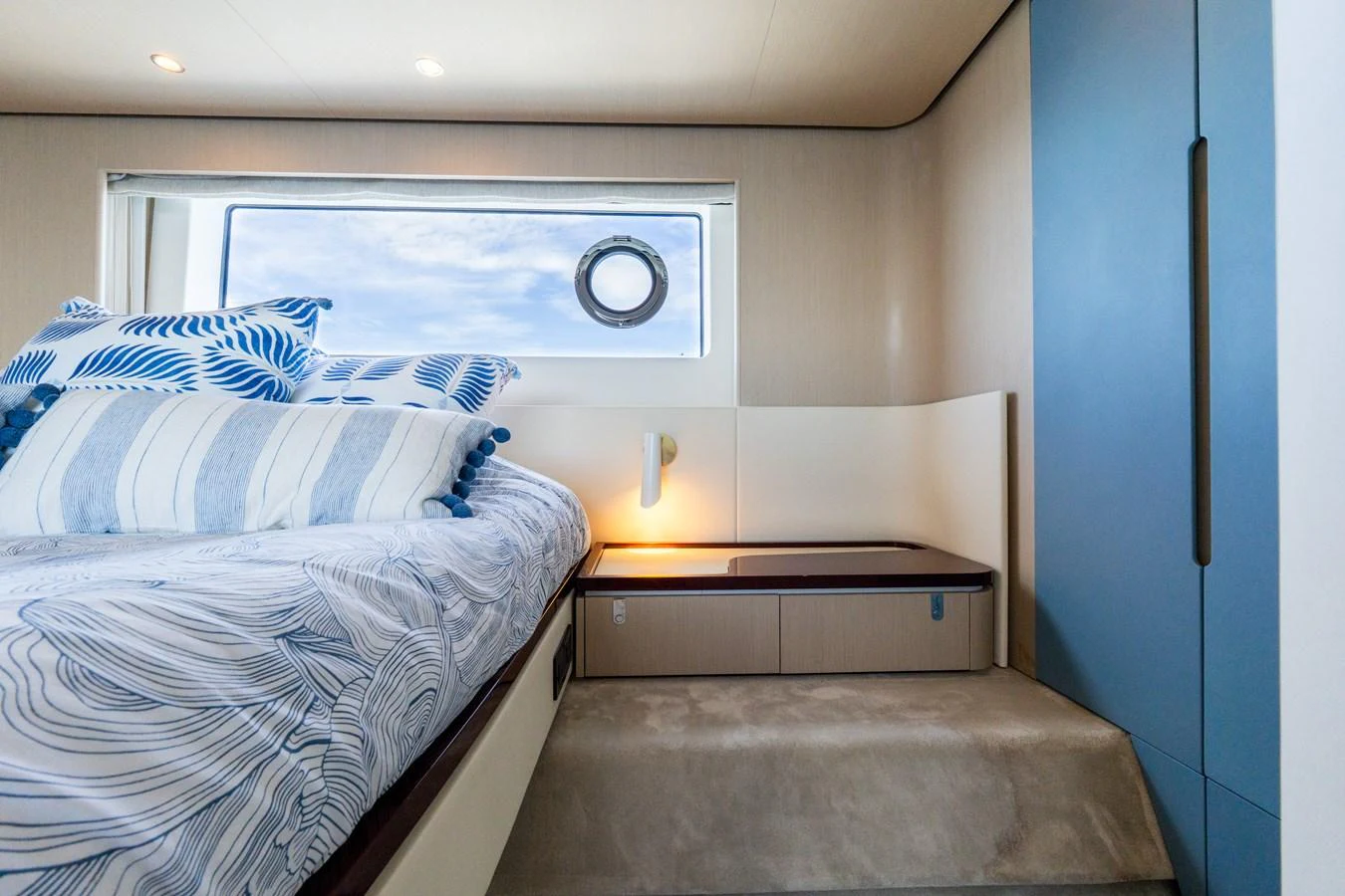 A cozy stateroom with a large bed and modern decor. aboard GONE PHISHING Yacht for Sale