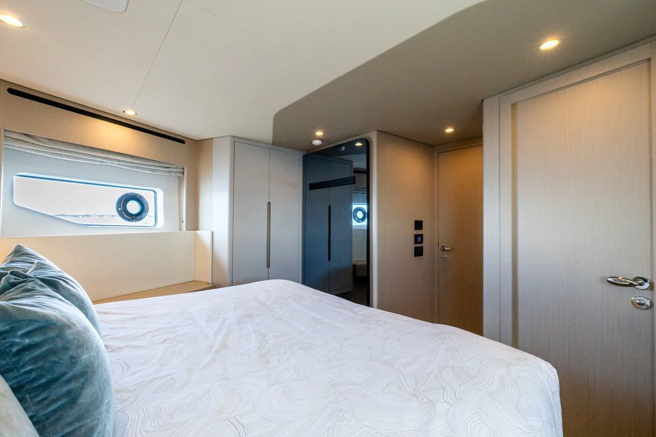The stateroom features a comfortable bed with elegant bedding and modern furnishings. aboard GONE PHISHING Yacht for Sale