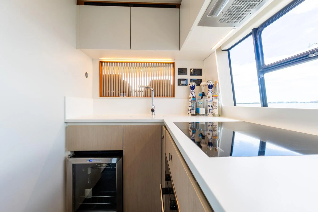The galley features modern appliances and a sleek design with ample natural light. aboard GONE PHISHING Yacht for Sale
