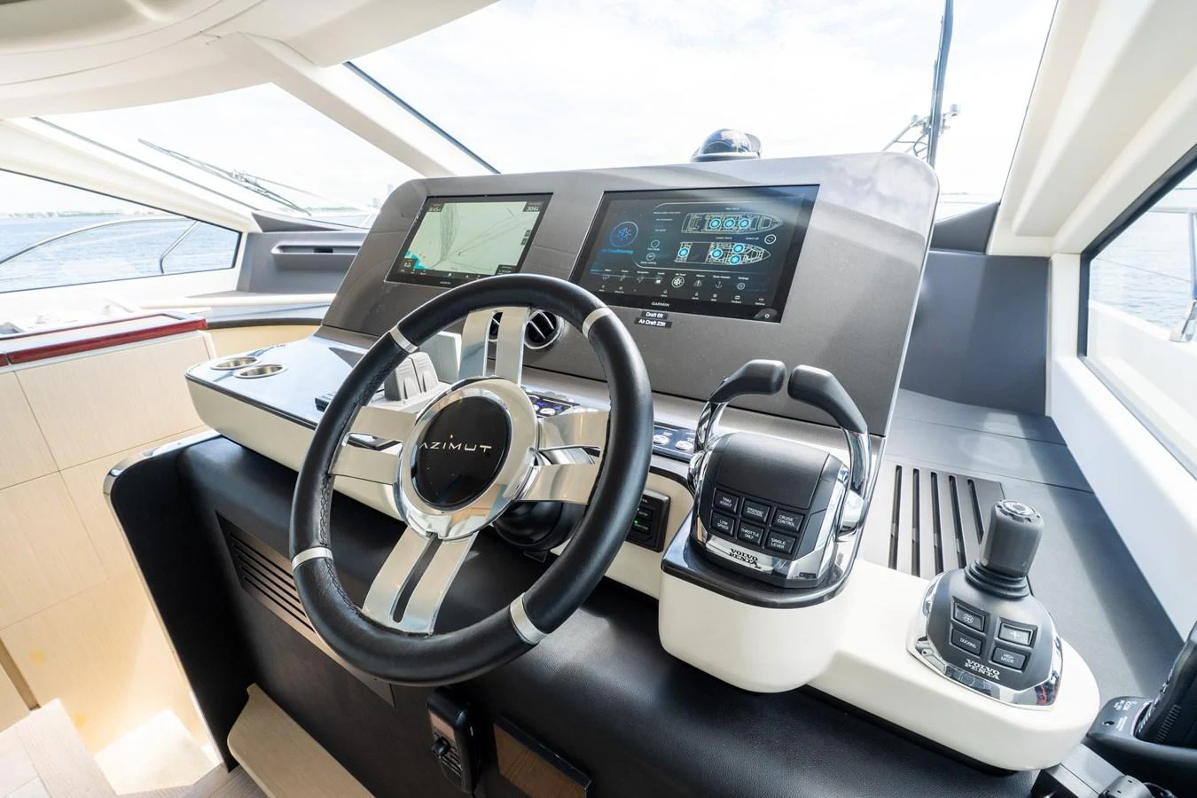 The helm station features advanced navigation equipment and a sleek, modern design. aboard GONE PHISHING Yacht for Sale