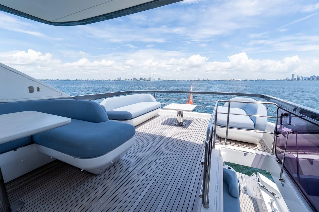 The aft deck offers a spacious lounging area with stunning ocean views. aboard GONE PHISHING Yacht for Sale