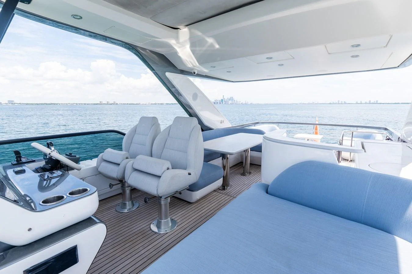 The flybridge offers a spacious and comfortable seating area with stunning ocean views. aboard GONE PHISHING Yacht for Sale