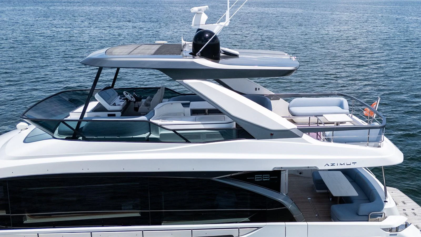 This sleek yacht features a spacious flybridge with modern amenities, perfect for luxurious cruising. aboard GONE PHISHING Yacht for Sale