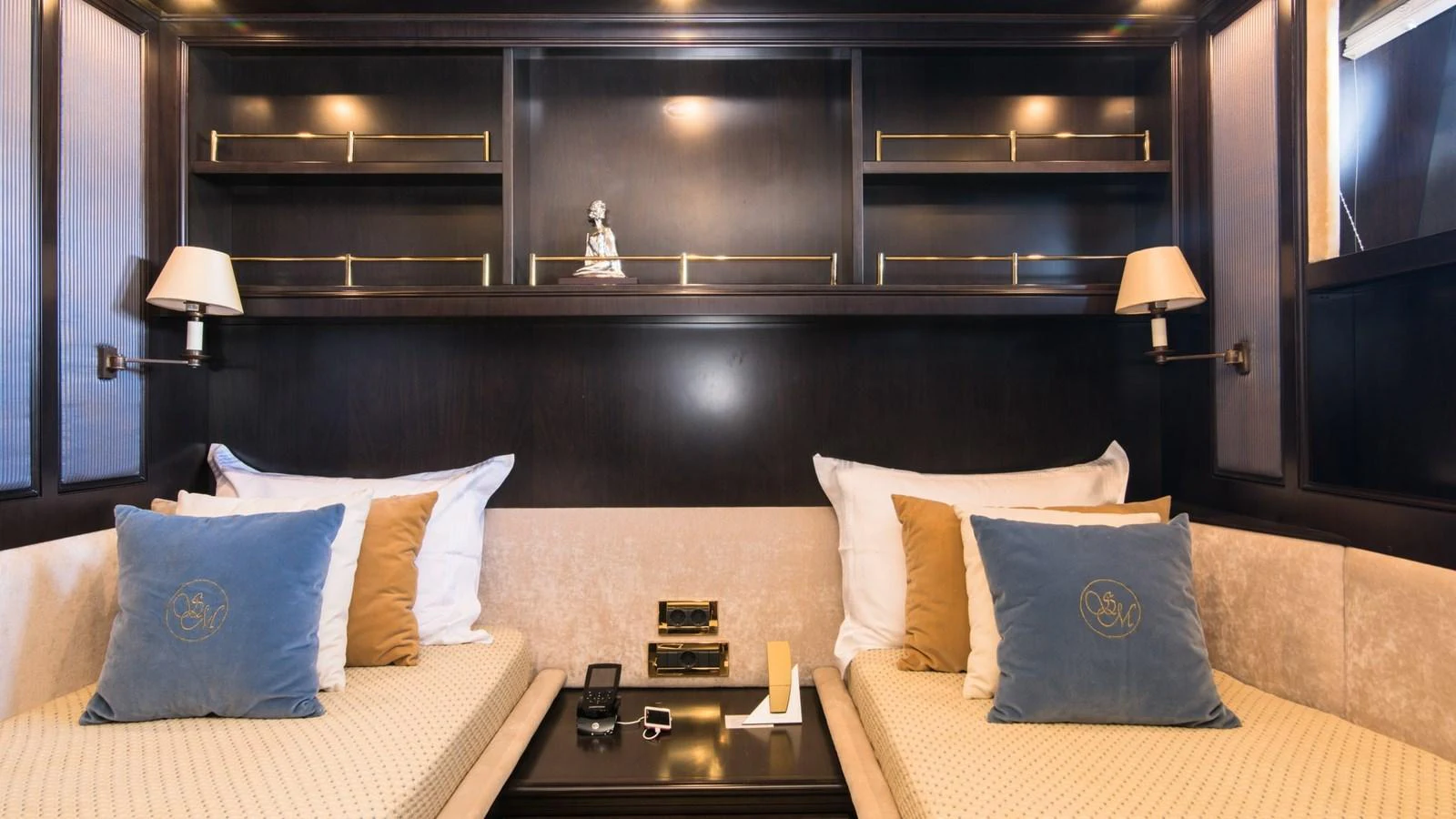 The guest stateroom offers a cozy and elegant space with twin beds and luxurious decor. aboard LA STELLA DEI MARI Yacht for Sale
