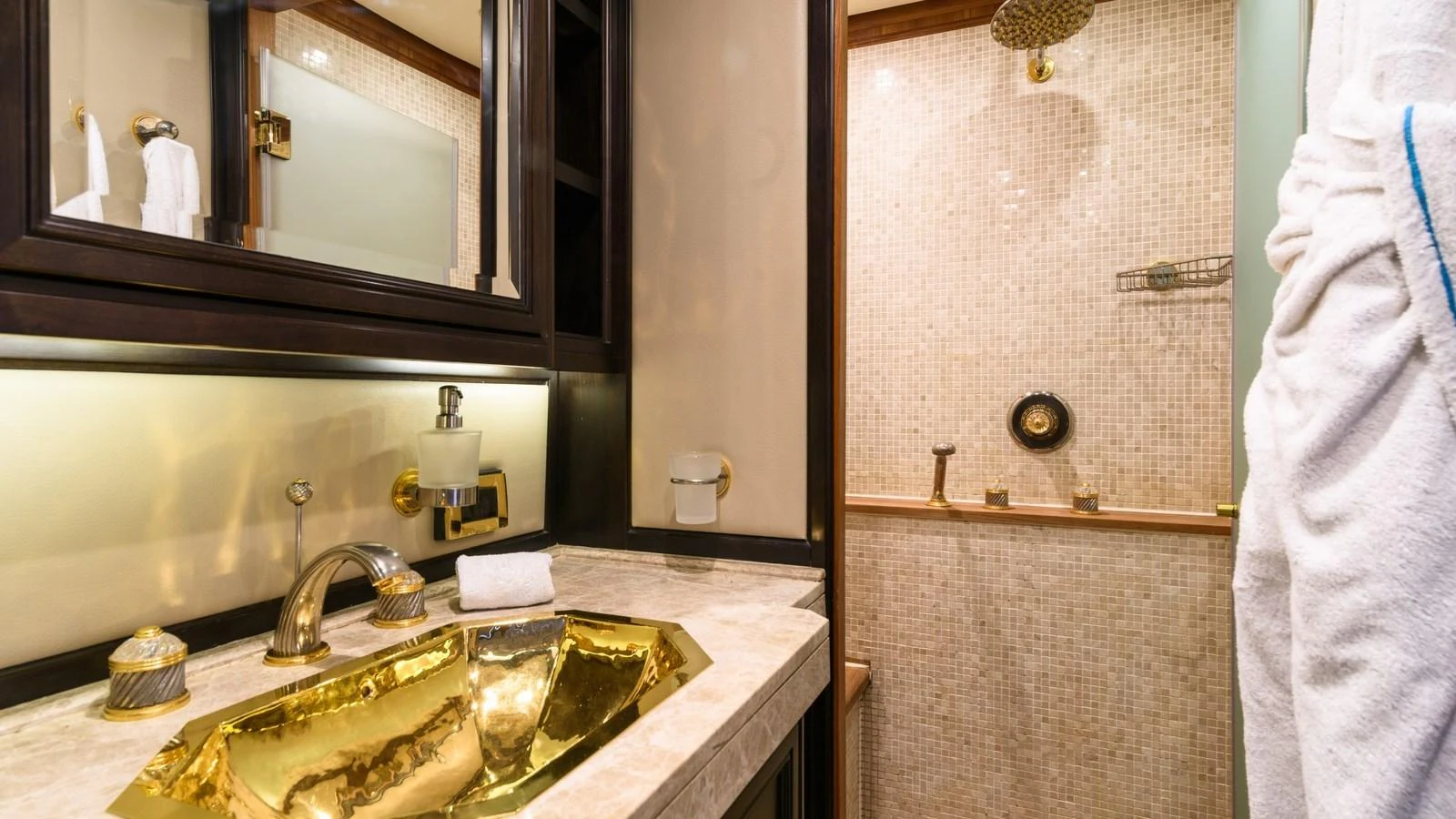 The yacht's bathroom features luxurious fixtures and a spacious shower area. aboard LA STELLA DEI MARI Yacht for Sale