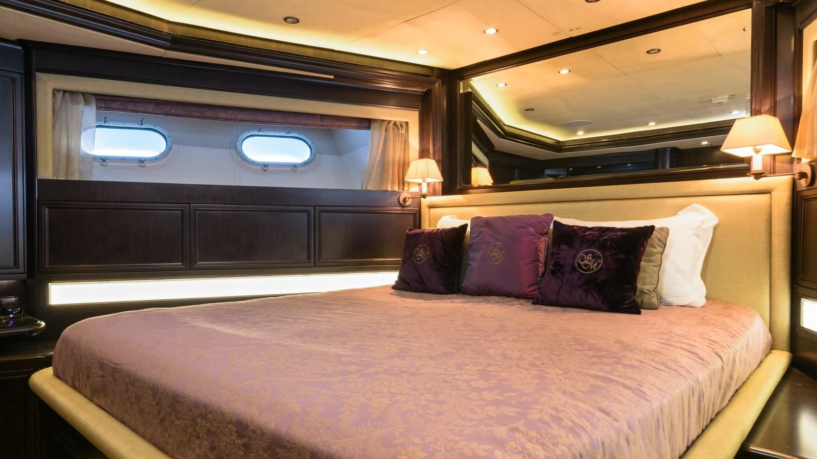 The master stateroom features a luxurious bed with elegant lighting and stylish decor. aboard LA STELLA DEI MARI Yacht for Sale