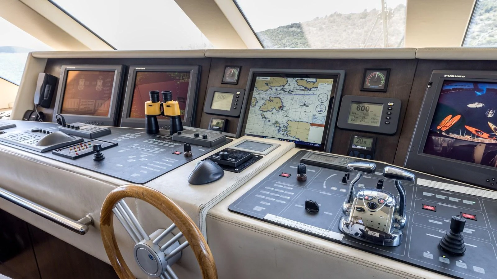 The helm station features advanced navigation equipment and luxurious finishes. aboard LA STELLA DEI MARI Yacht for Sale