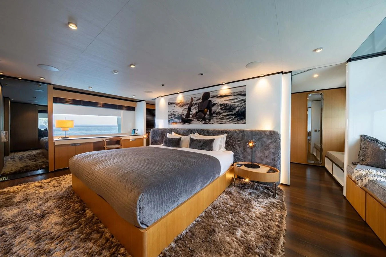The master stateroom offers a luxurious and spacious retreat with elegant furnishings and a serene ambiance. aboard MR. T Yacht for Sale