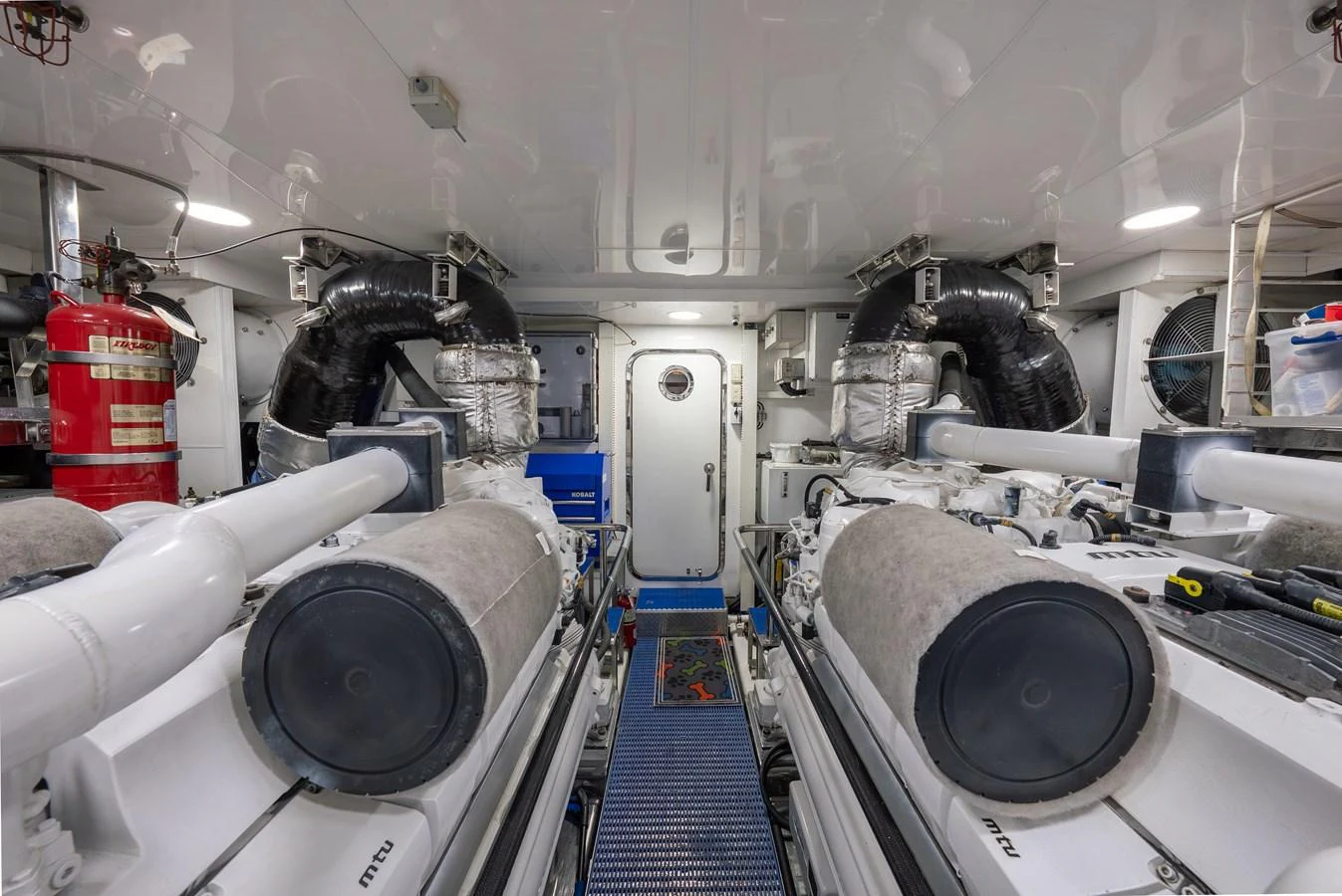 The engine room showcases the yacht's powerful and meticulously maintained machinery. aboard ABOAT TIME Yacht for Sale
