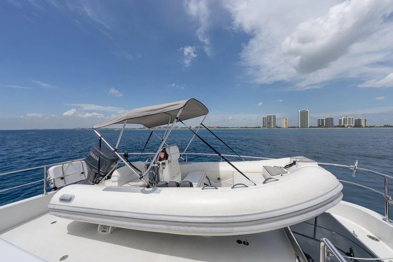 A sleek tender is securely fastened on the deck, ready for excursions. aboard ABOAT TIME Yacht for Sale