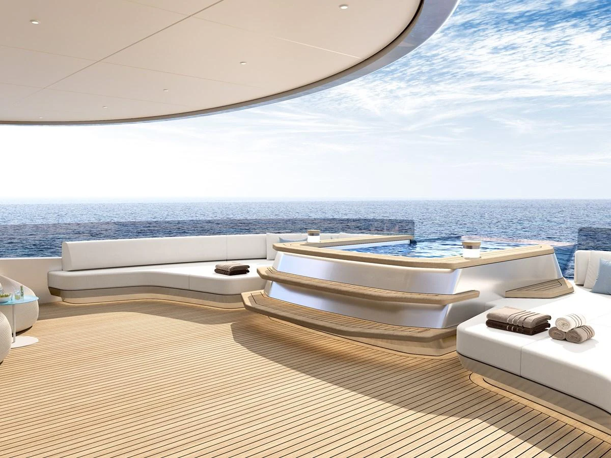 The sundeck features a luxurious jacuzzi surrounded by elegant seating with stunning ocean views. aboard LIVIA Yacht for Sale