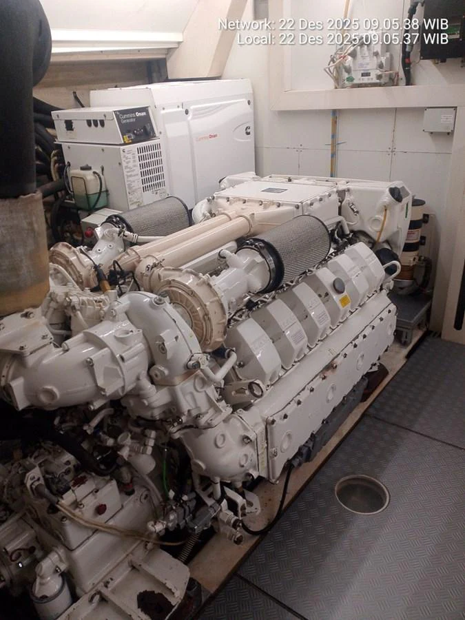 The image showcases the yacht's engine room with a powerful engine and machinery. aboard ABIGAIL Yacht for Sale