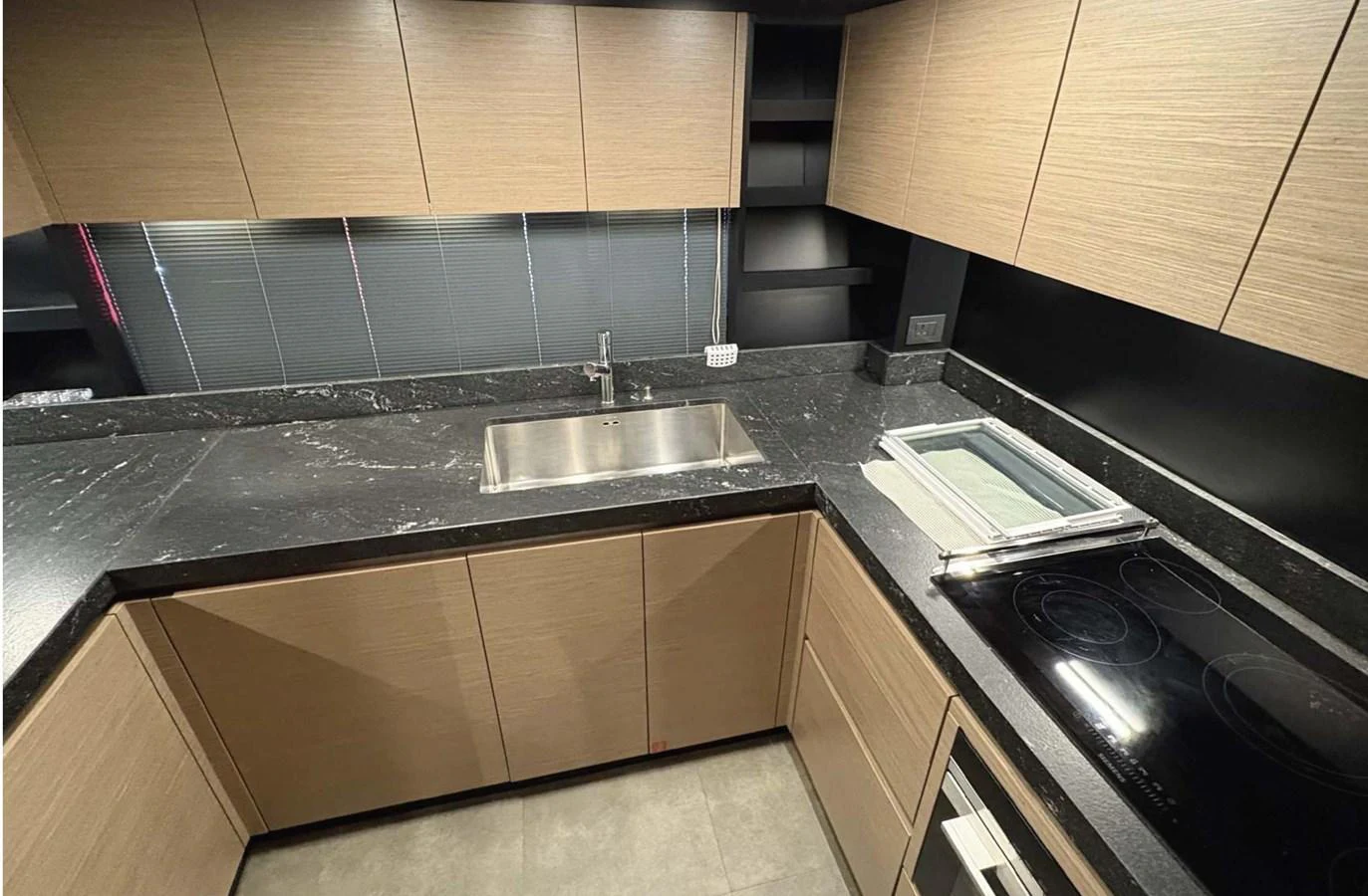 The yacht's galley features modern cabinetry and sleek countertops. aboard ABIGAIL Yacht for Sale