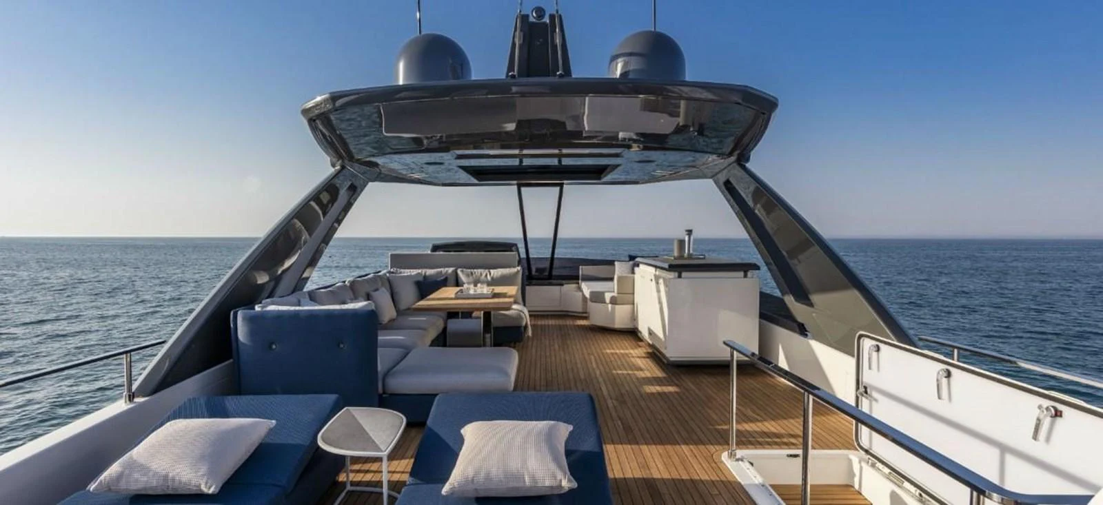 The flybridge offers a spacious and luxurious outdoor living area with ample seating and stunning ocean views. aboard ABIGAIL Yacht for Sale