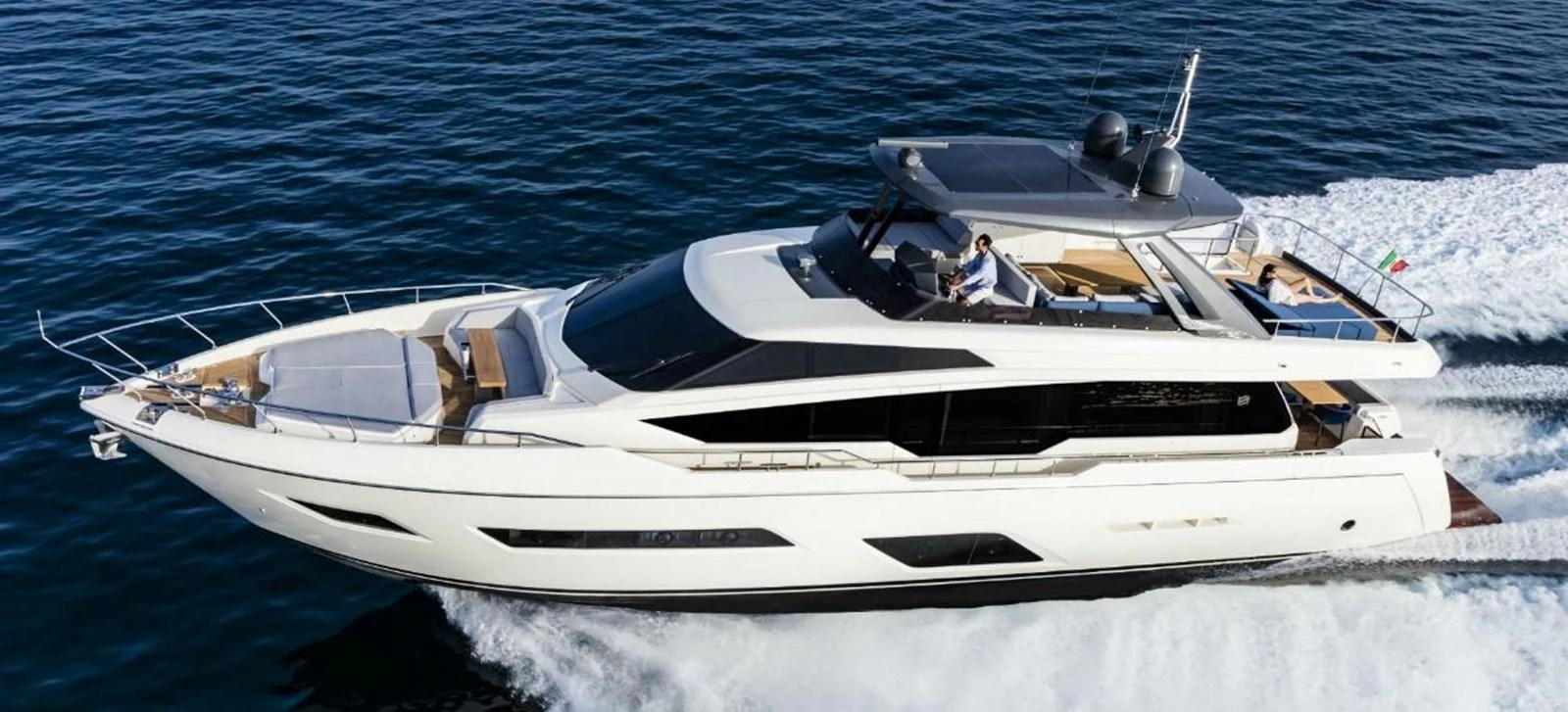 A sleek and modern yacht cruises swiftly through the water, showcasing its elegant design and luxurious amenities. aboard ABIGAIL Yacht for Sale