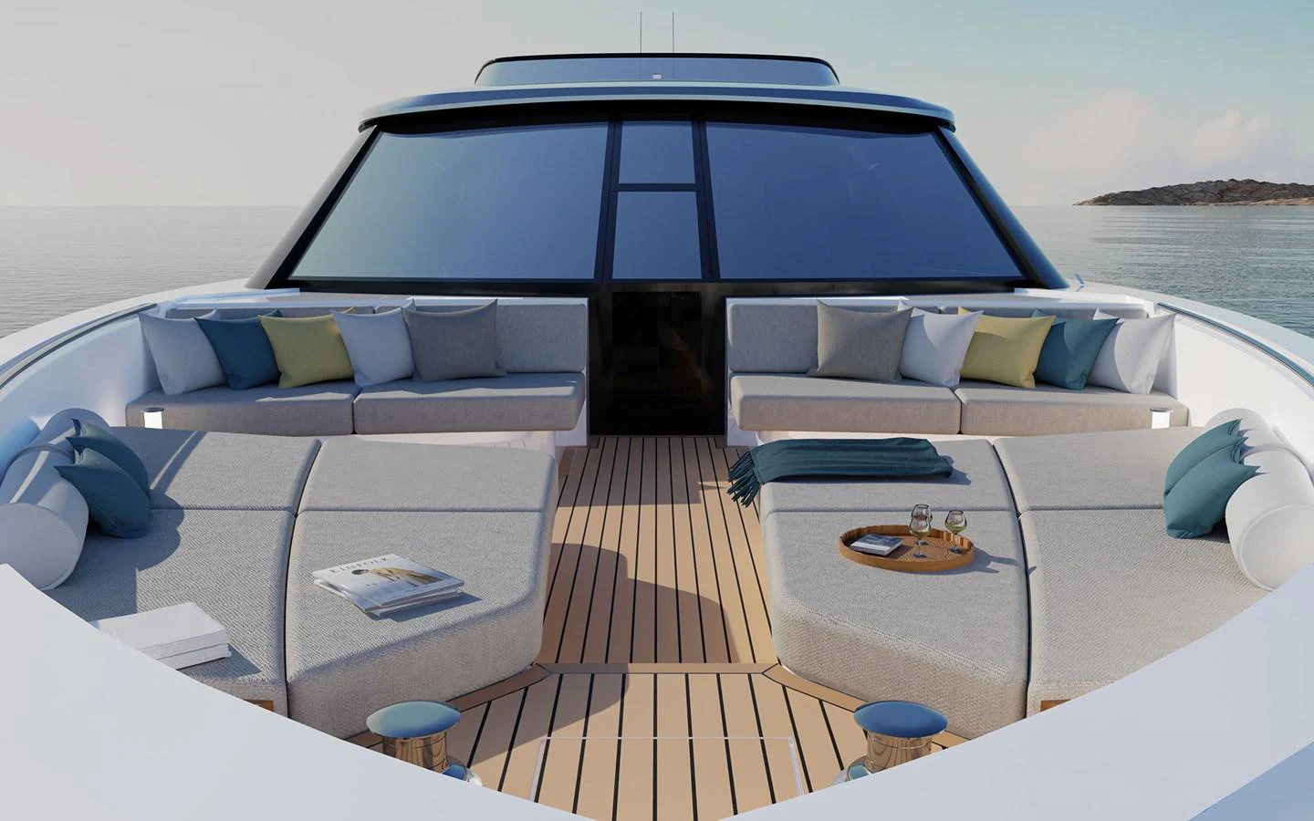 The foredeck offers a spacious lounging area with plush seating and a serene ocean view. aboard 66 Yacht for Sale