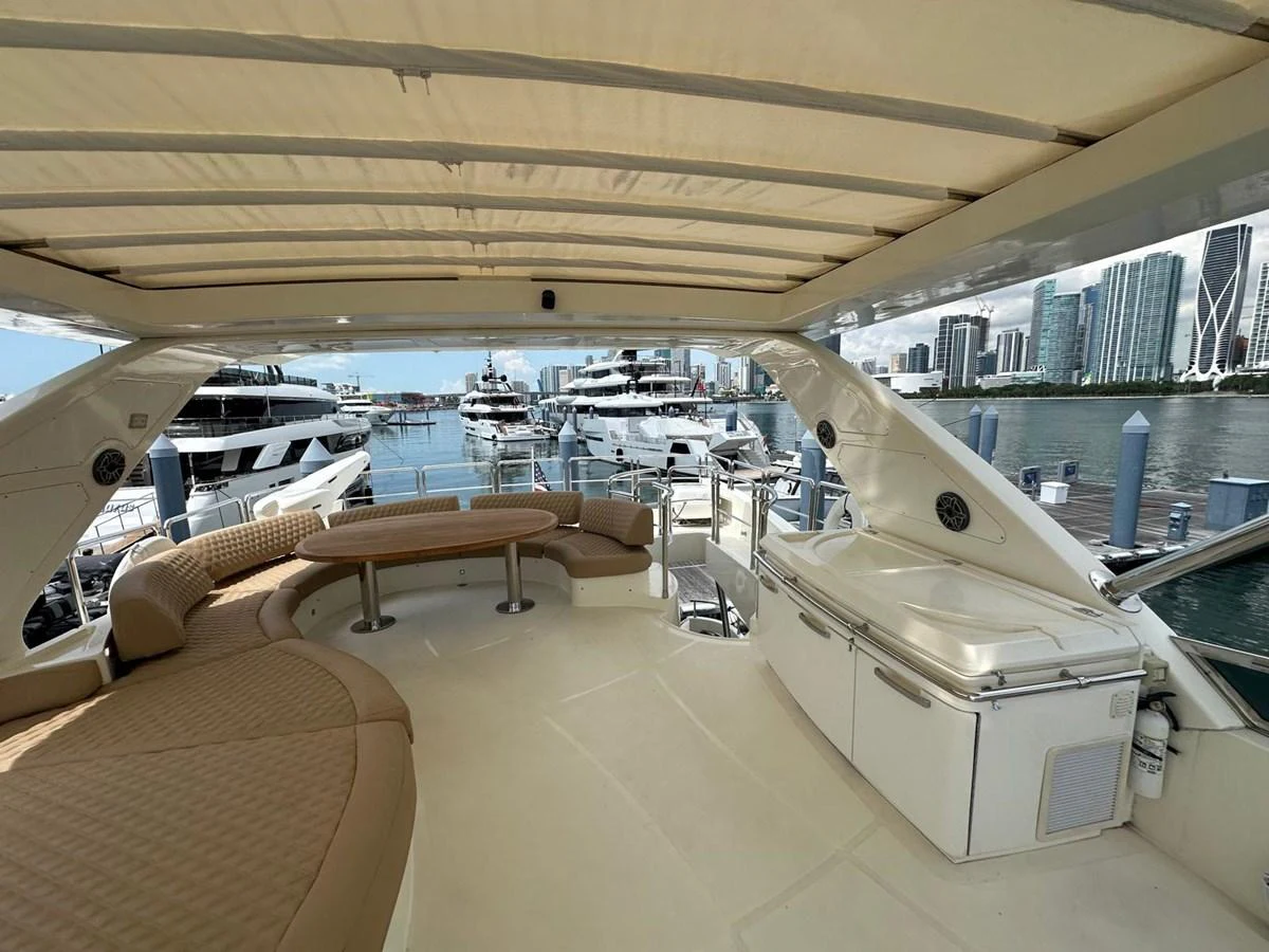 The flybridge offers a spacious and comfortable area with ample seating and a stunning view of the marina. aboard 75FT AZIMUT 2010, MINIMAL RISK Yacht for Sale