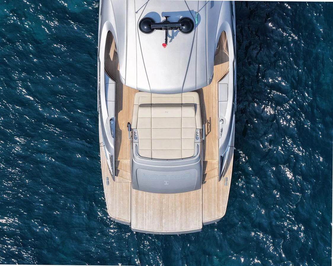 The yacht's aft deck offers a spacious sunbathing area with a stunning view of the surrounding water. aboard VENTUS 1 Yacht for Sale