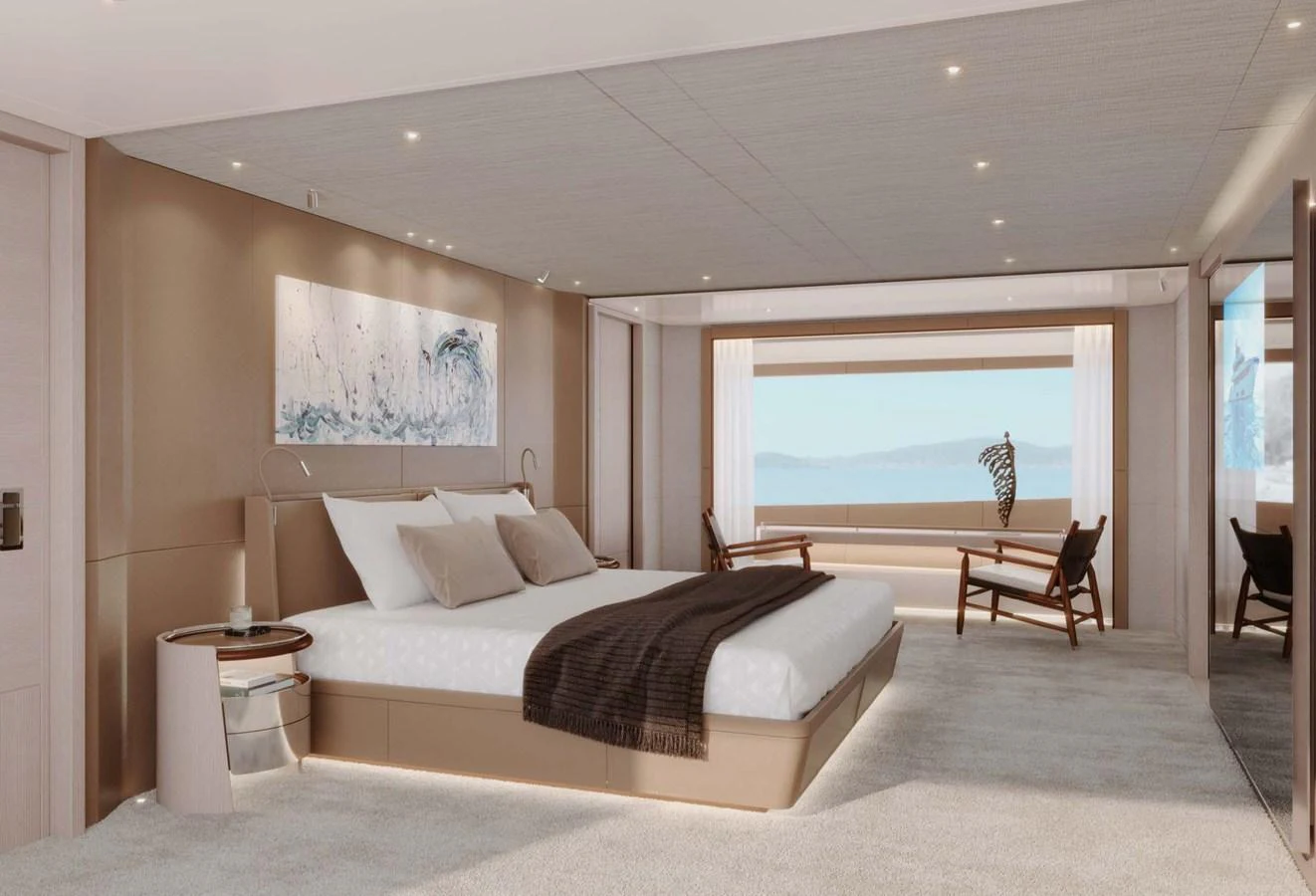 The master stateroom offers a luxurious and serene retreat with a stunning view of the sea. aboard LUMINA Yacht for Sale