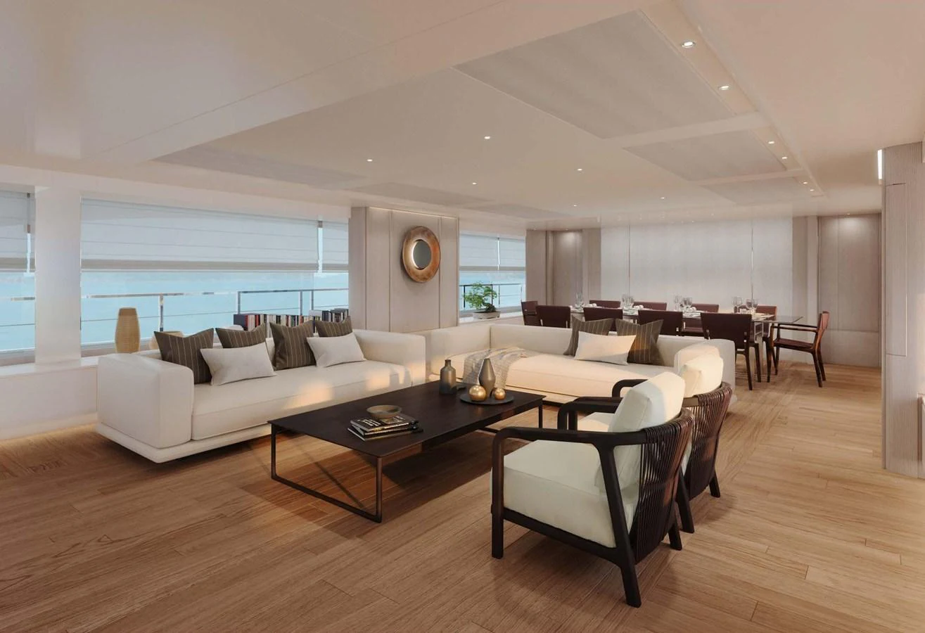The yacht's salon features elegant seating and a sophisticated dining area with ample natural light. aboard LUMINA Yacht for Sale