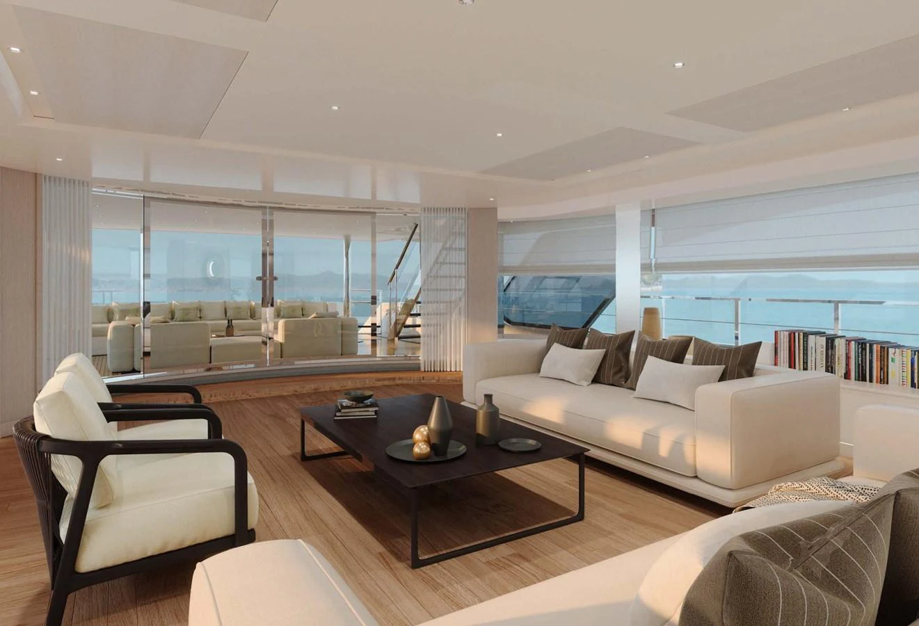 The salon features a spacious and elegantly designed seating area with modern furnishings and panoramic windows. aboard LUMINA Yacht for Sale