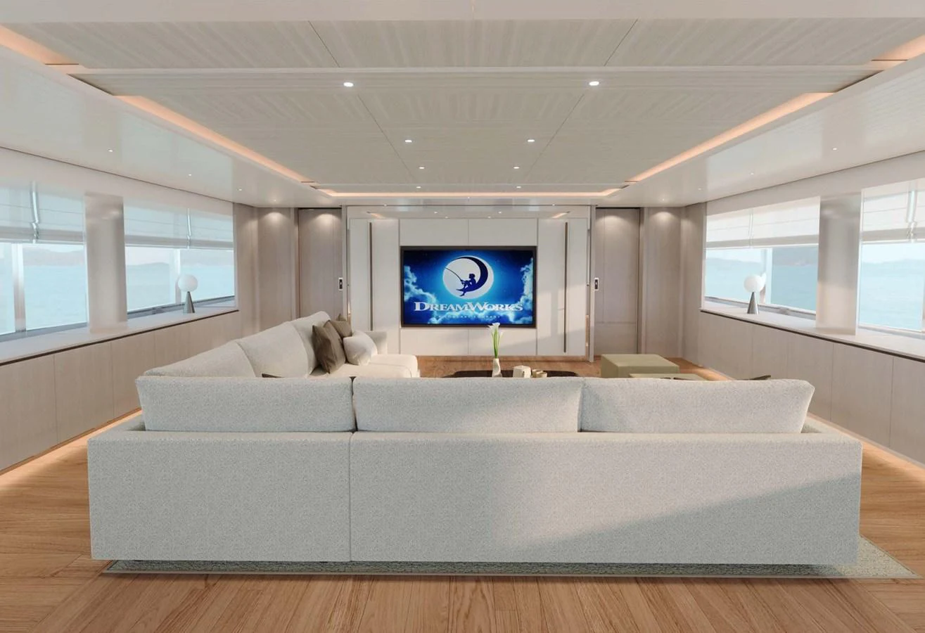 The spacious salon features a large, comfortable sofa and a state-of-the-art entertainment system. aboard LUMINA Yacht for Sale