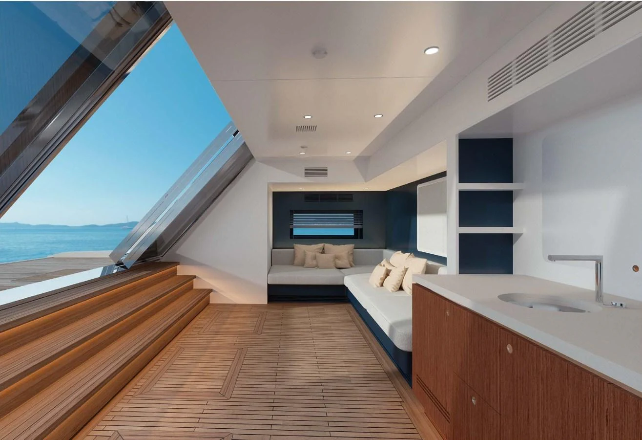 A modern and spacious interior with large windows offering stunning ocean views. aboard LUMINA Yacht for Sale