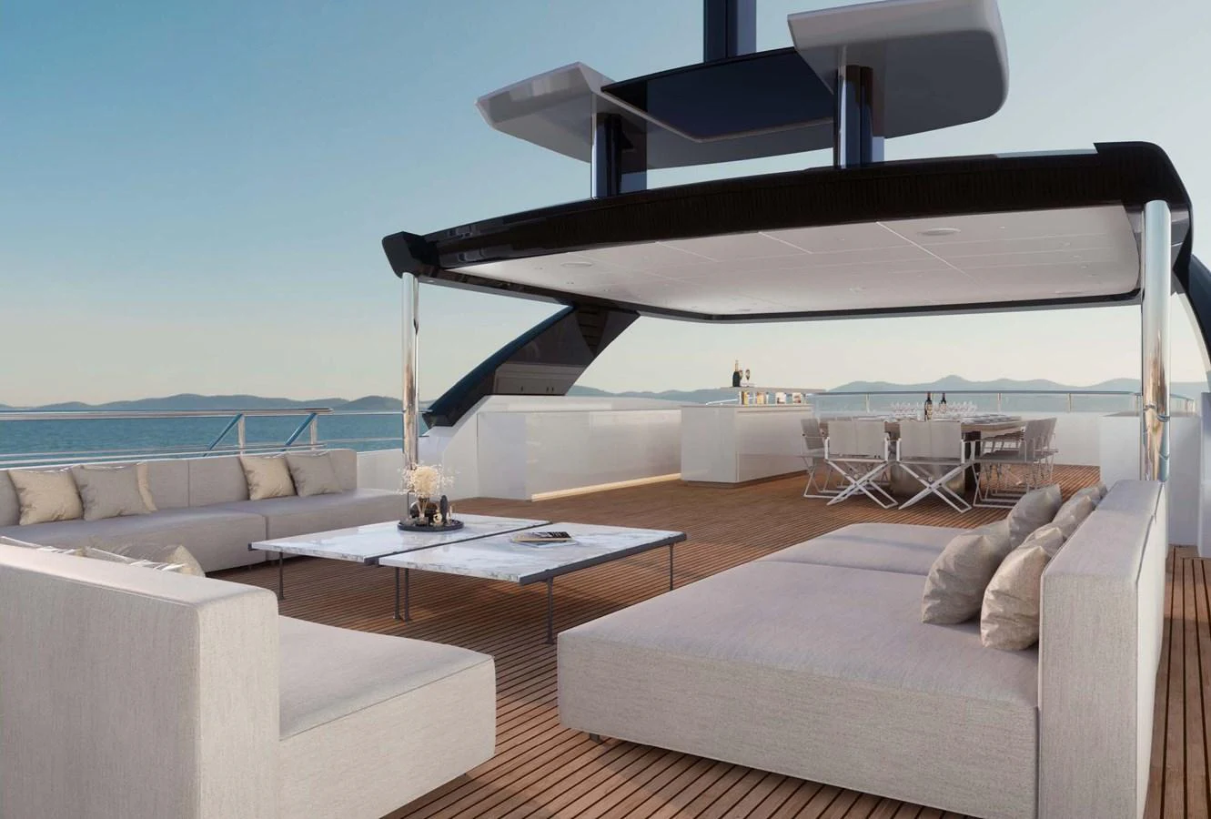 The sundeck offers a luxurious outdoor lounging area with ample seating and stunning ocean views. aboard LUMINA Yacht for Sale