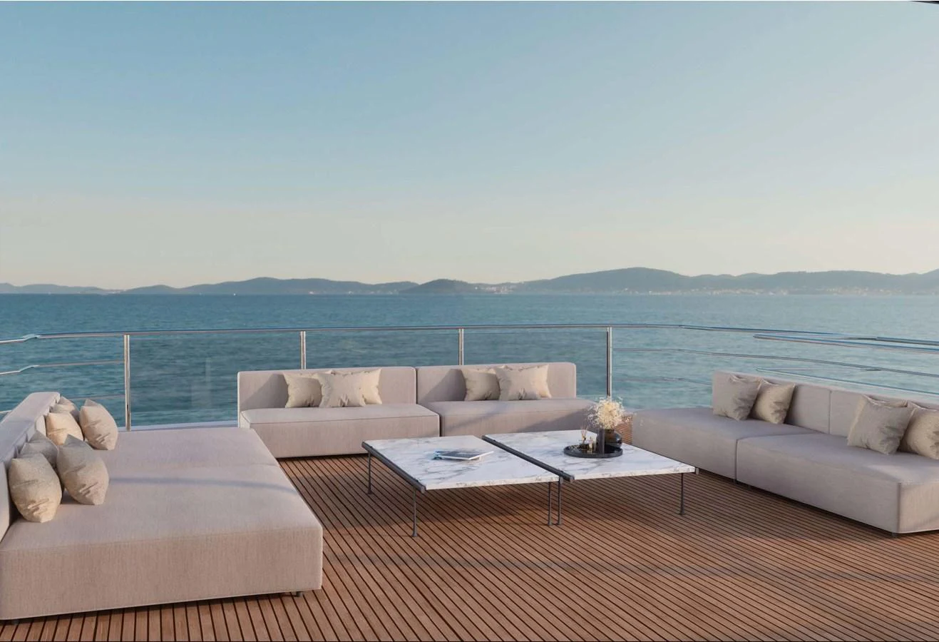 The sundeck offers a spacious and serene lounging area with panoramic ocean views. aboard LUMINA Yacht for Sale