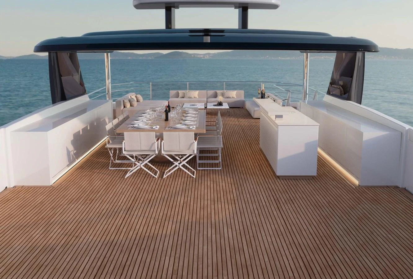 The sundeck offers a spacious and elegant area for dining and relaxation with stunning sea views. aboard LUMINA Yacht for Sale