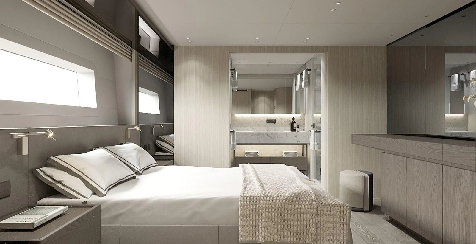 The master stateroom features a luxurious bed with modern decor and ample natural light. aboard TOO COOL Yacht for Sale