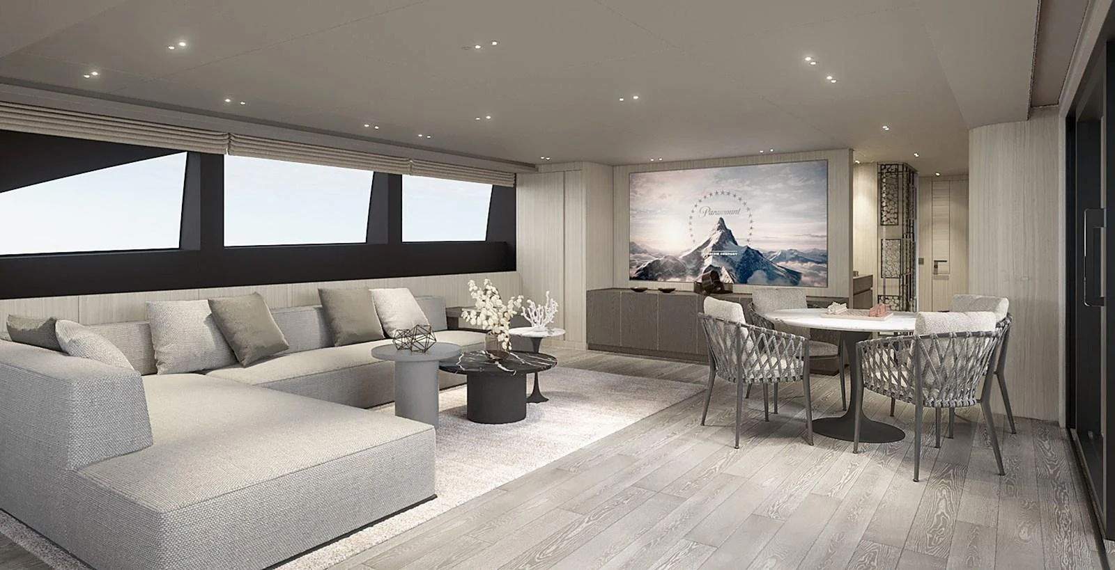 The spacious salon features modern furnishings and a large flat-screen TV, creating an inviting atmosphere for relaxation. aboard TOO COOL Yacht for Sale