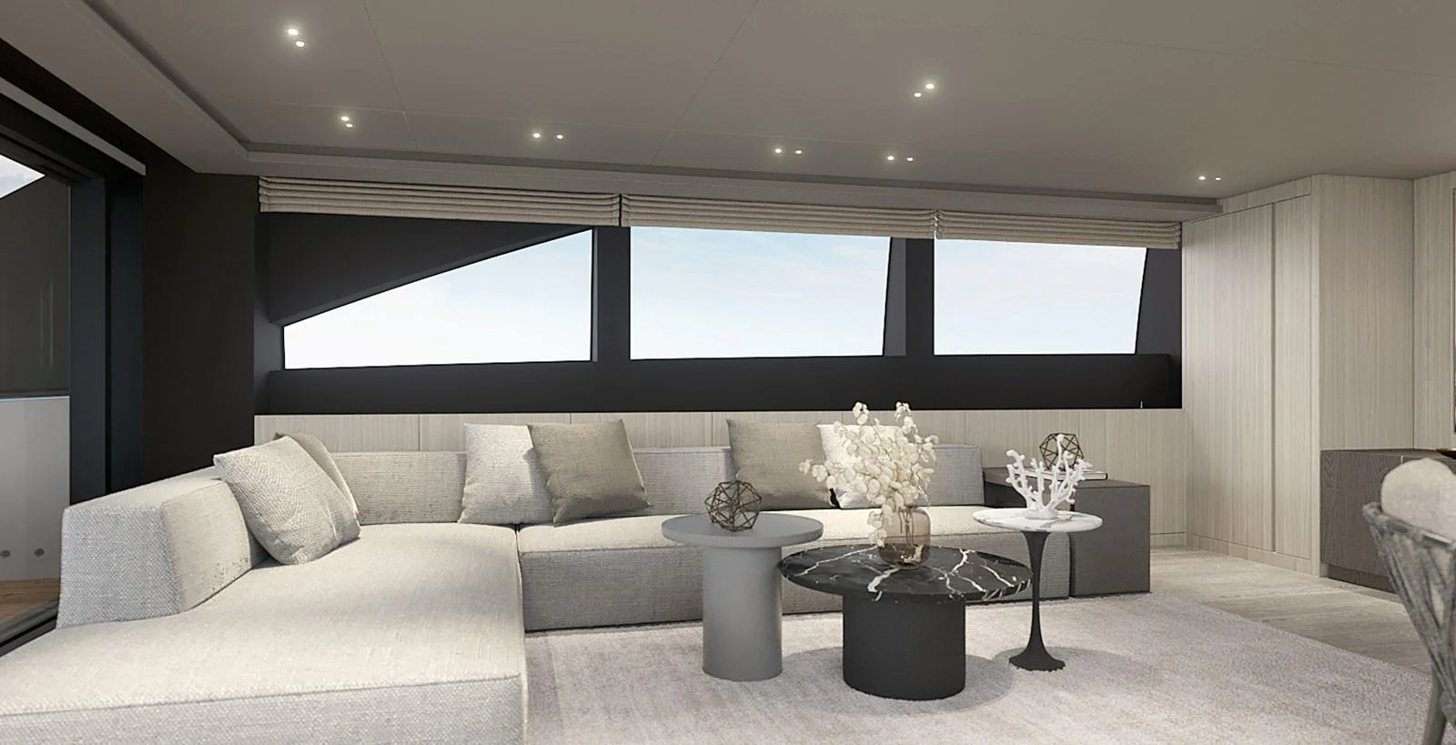 The salon features a modern and elegant design with comfortable seating and stylish decor. aboard TOO COOL Yacht for Sale